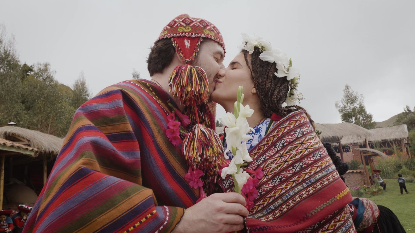 Bride and groom kiss during an Andean wedding ceremony in the Sacred Valley